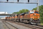 Eastbound intermodal threads its way through the crossovers